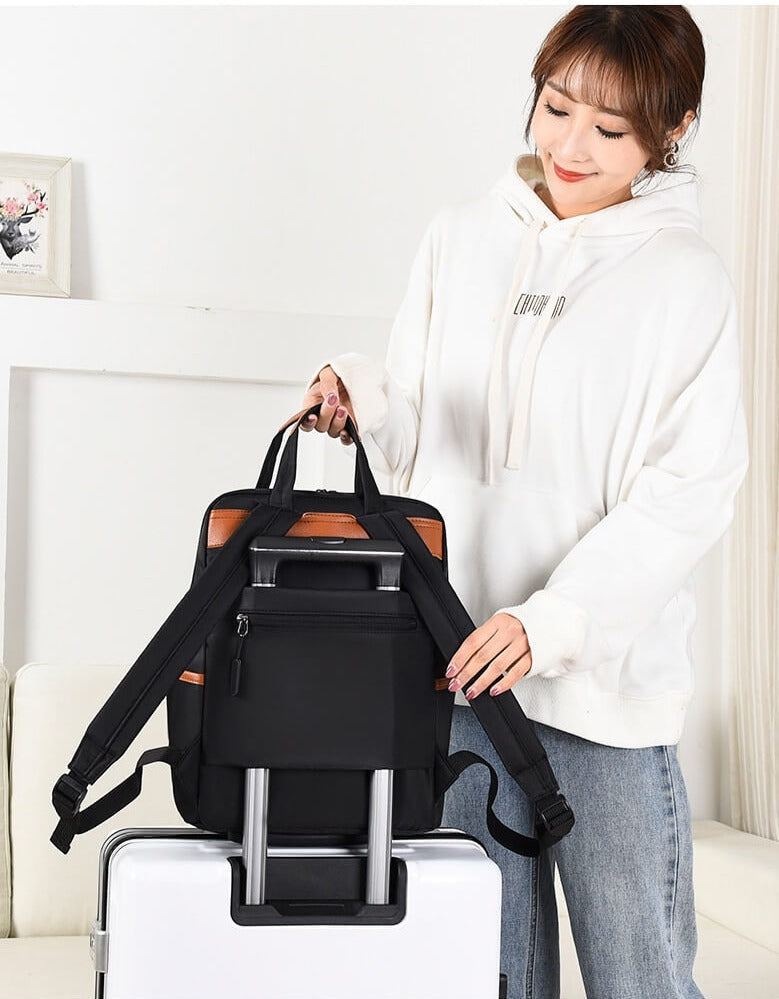 Spacious lightweight anti-theft travel backpack, water-resistant for commuters & students.