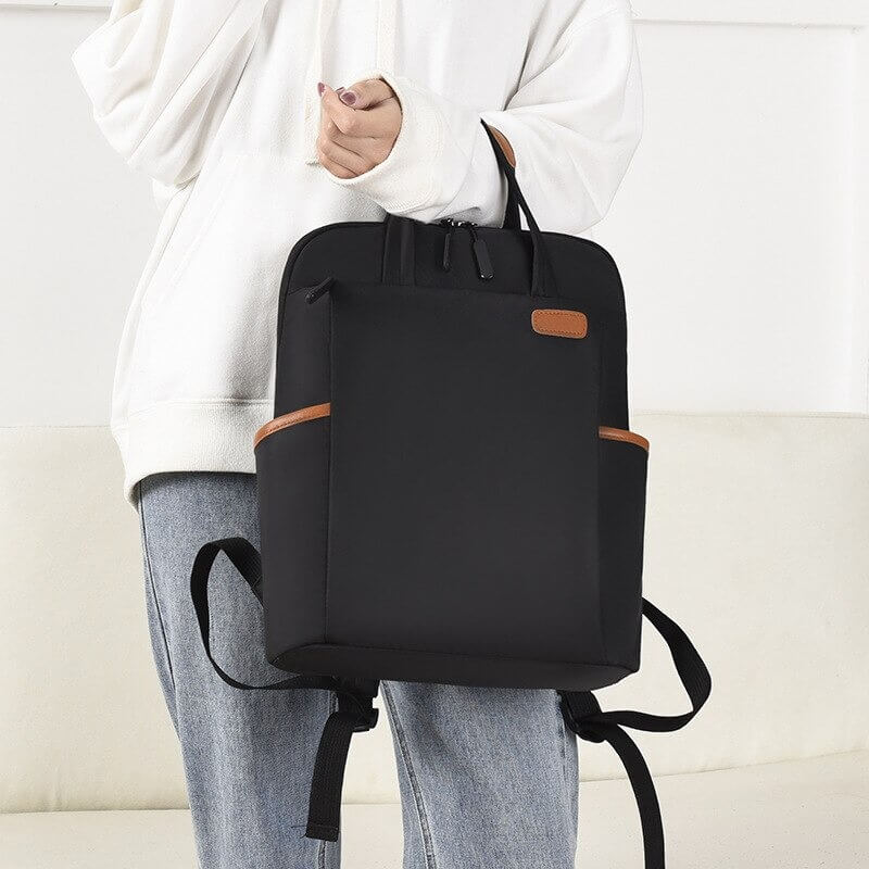 Premium anti-theft travel backpack, lightweight, water-resistant Oxford fabric for unisex use.