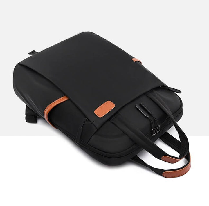 Sleek Oxford fabric anti-theft daypack, lightweight and water-resistant for urban travel.