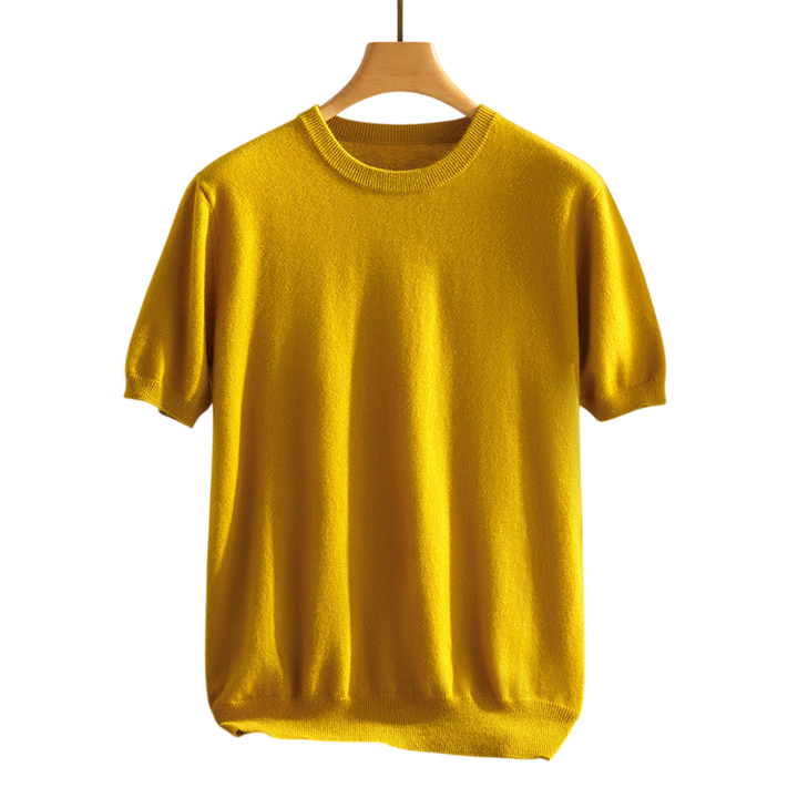 Model wearing a relaxed fit unisex cashmere crewneck tee, demonstrating comfort and versatile, breathable style.