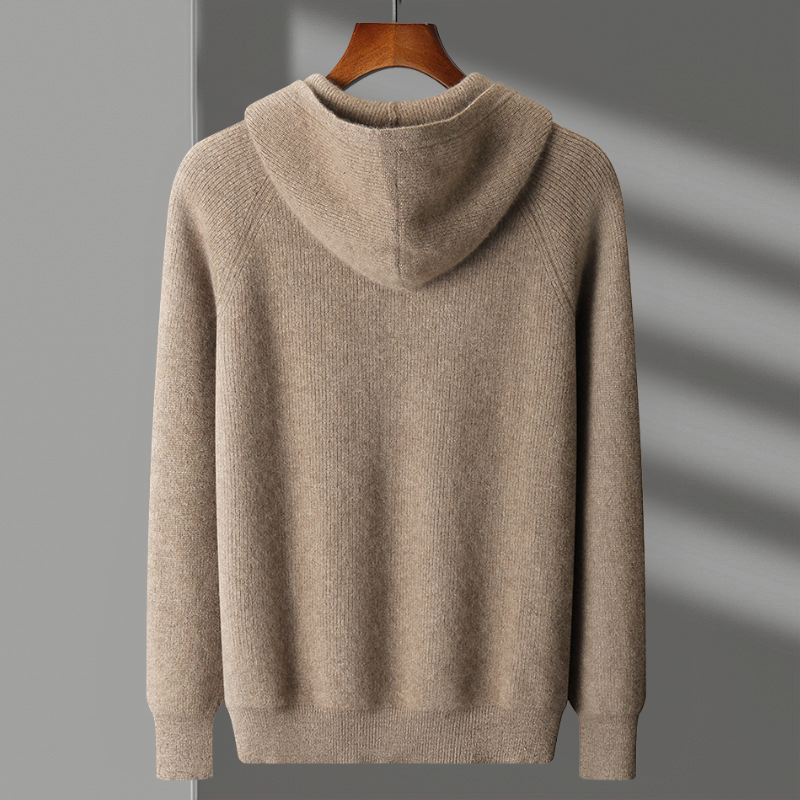 Unisex Merino Wool Full-Zip Hoodie with its hood up, illustrating warmth and comfort.