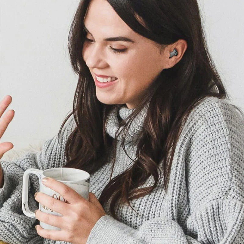 Versatile mini Bluetooth earbuds, waterproof & noise-cancelling for travel, work, or gym. Wireless in-ear design.