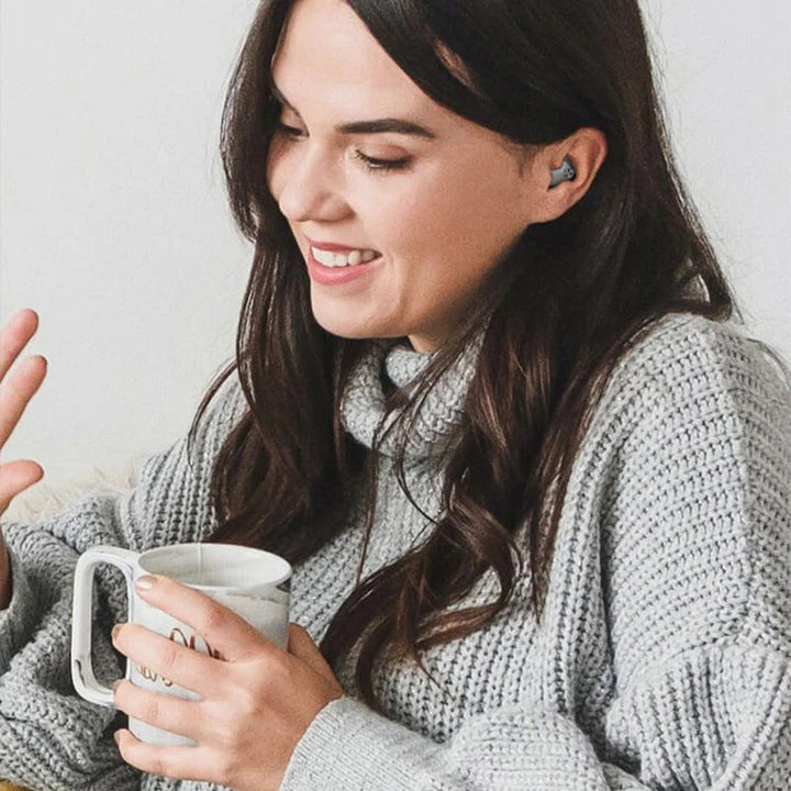 Versatile mini Bluetooth earbuds, waterproof & noise-cancelling for travel, work, or gym. Wireless in-ear design.