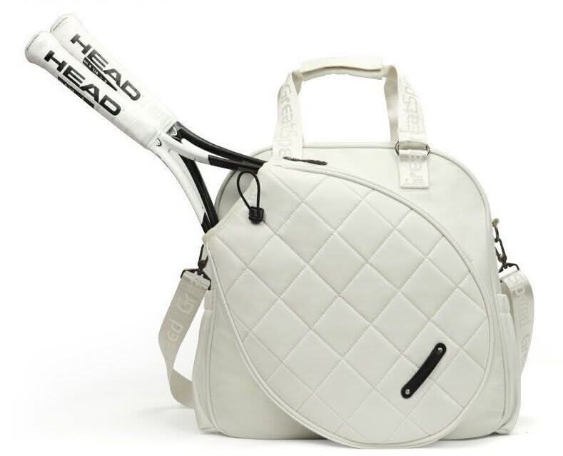 Durable unisex athletic bag for tennis & padel gear, featuring a multi-compartment design for optimal organization.