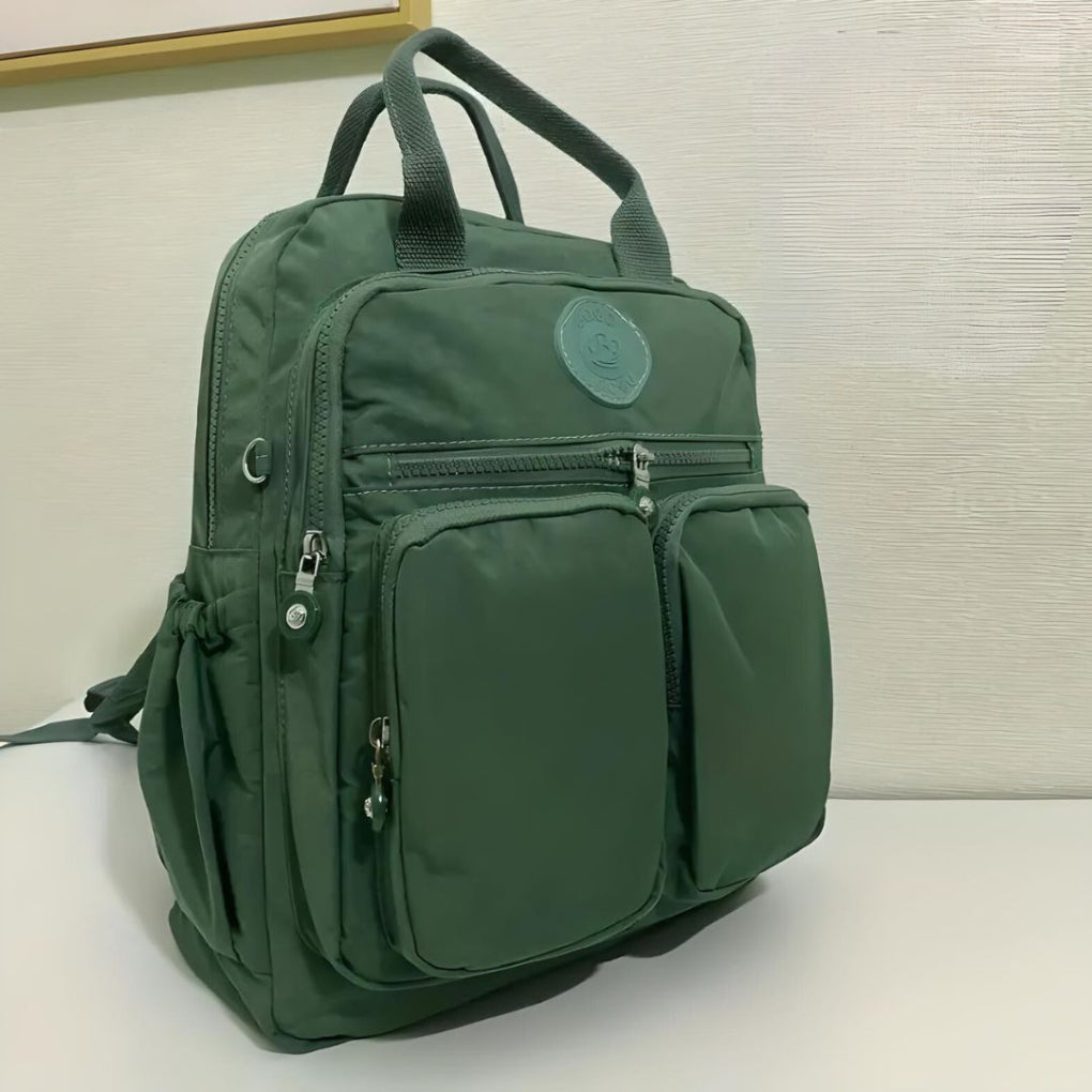 Trendy multi-pocket unisex backpack, a fashion accessory & essential school bag for all students.