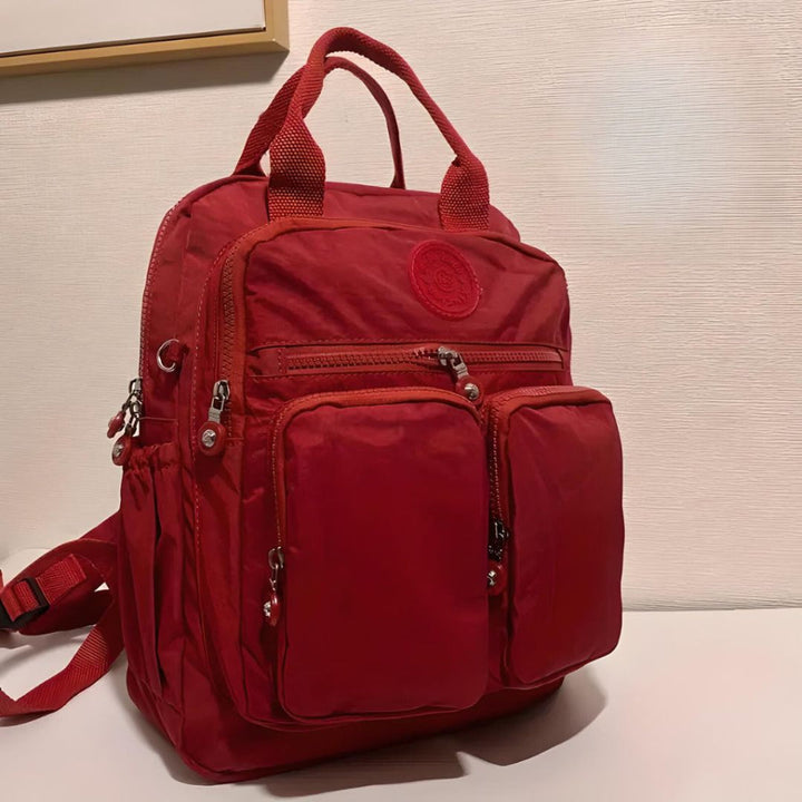 Fashionable unisex multi-pocket backpack, ideal for students & professionals needing organized storage.