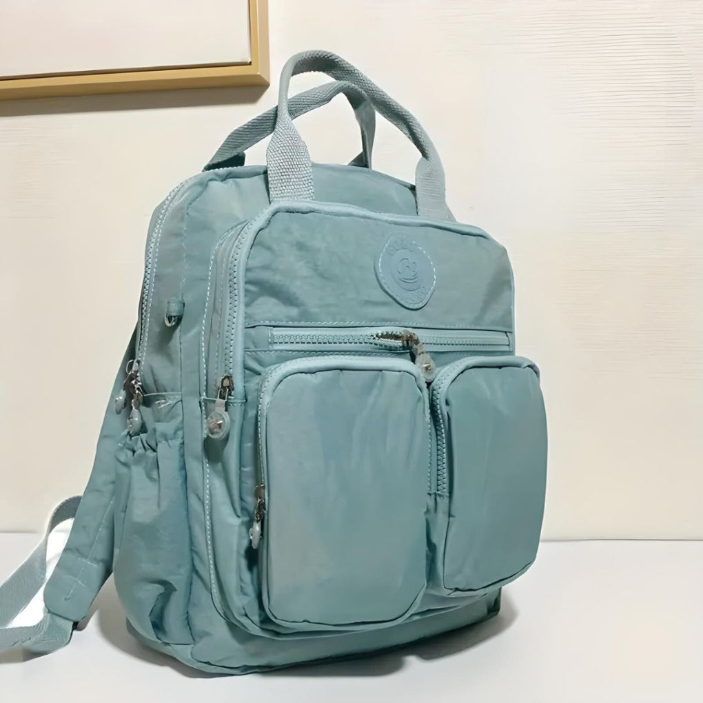 Practical unisex multi-pocket backpack bag for school, work, and everyday organization.