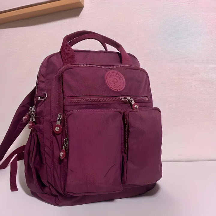Functional multi-pocket unisex backpack bag, great for students & commuters needing organized storage.