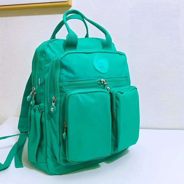 Spacious multi-pocket unisex backpack, ideal as a travel bag or work bag with secure compartments.