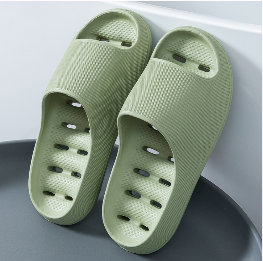 Close-up of soft, lightweight cloud cushion bathroom slippers, showing open-toe design for ultimate indoor comfort.