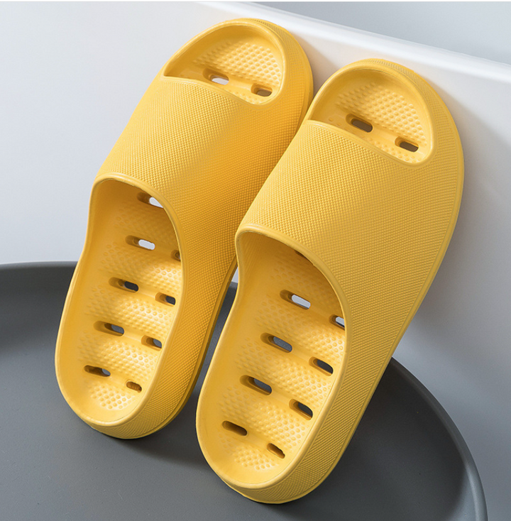 Side view of modern, unisex non-slip indoor slippers with thick cloud cushion sole for superior comfort & support.