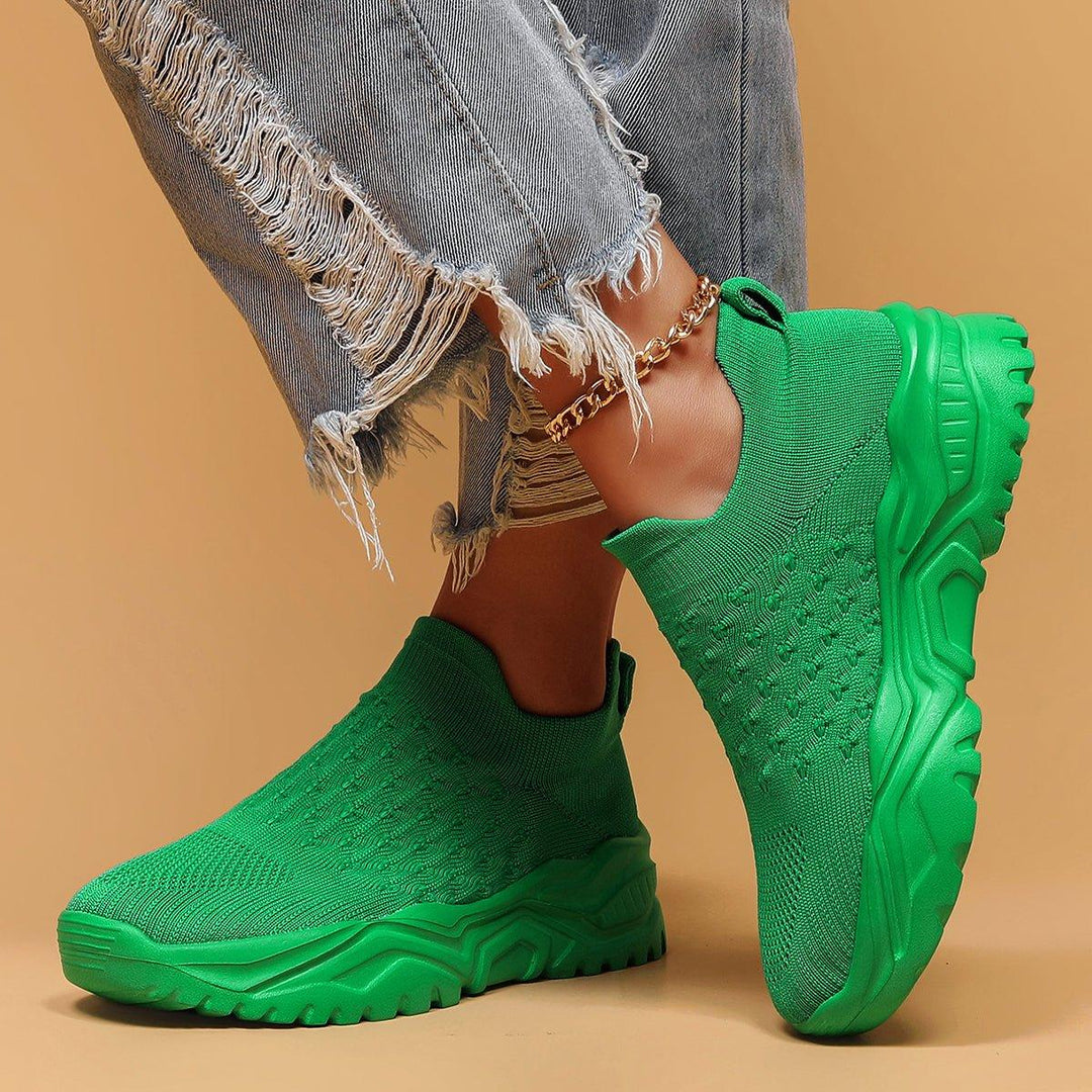 Green orthopedic slip-on shoes for men and women, featuring a lightweight and flexible design for comfort