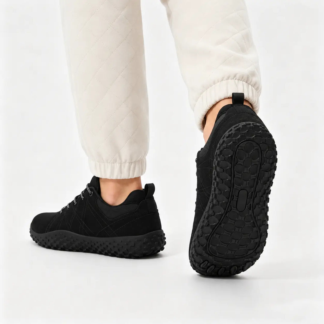 Unisex hiking trainers with wide toe box, zero drop, barefoot comfort for active outdoor use.