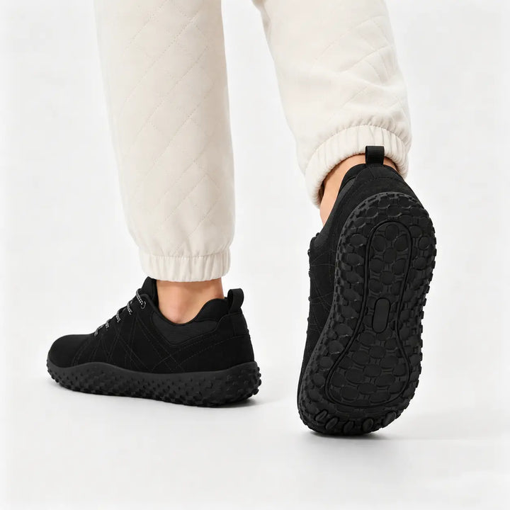 Unisex hiking trainers with wide toe box, zero drop, barefoot comfort for active outdoor use.