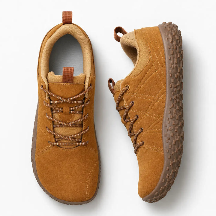 Unisex wide toe box barefoot trainers for hiking, walking, and natural outdoor active movement.