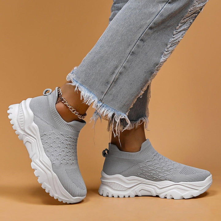 Ergonomic gray and white unisex cloud slip-on shoes, built for orthopedic comfort and easy wear