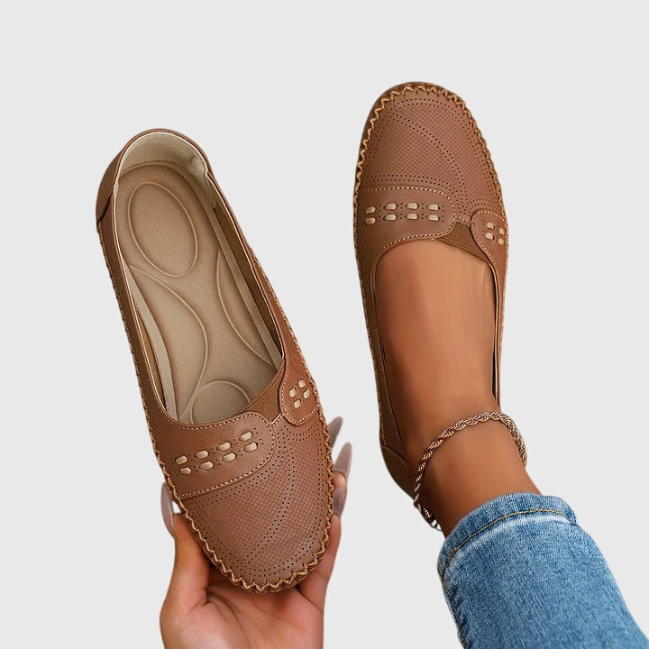 Ergonomic side profile of unisex orthopedic walking shoes, providing active foot support & pain relief.