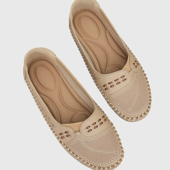 Casual unisex orthopedic walking shoes on foot, offering comfort, foot support & everyday pain relief.