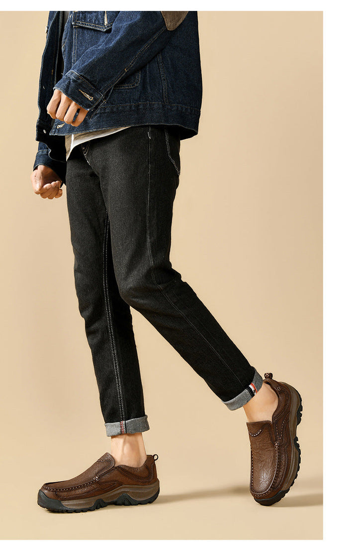 Model walking in black orthopedic comfort shoes, illustrating natural gait and support