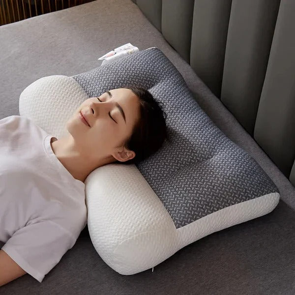 Unisex orthopedic neck pillow for pain relief. Ergonomic sleeping support for spinal alignment.