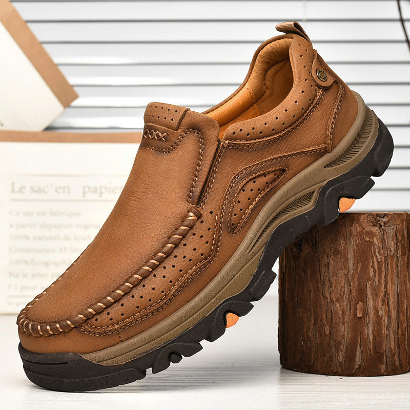 Close-up of the stitching details on a brown Unisex Orthopedic Transition Boot, quality craftsmanship.