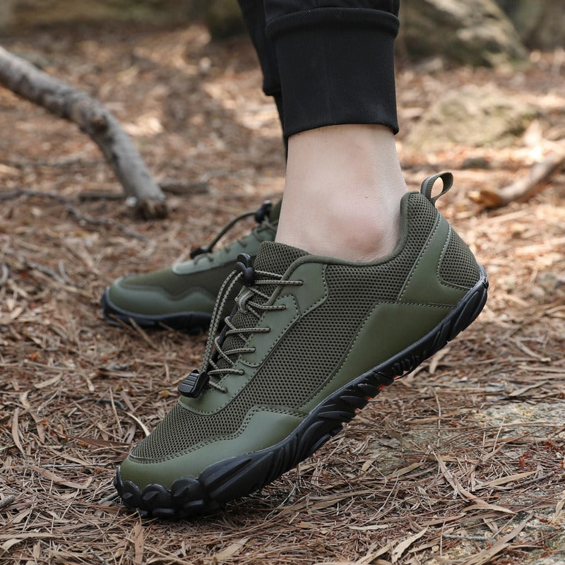 Flexible barefoot hiking trainers with wide toe box, comfortable for long trail walks.