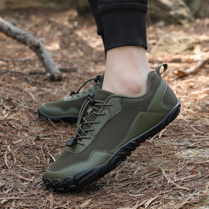 Flexible barefoot hiking trainers with wide toe box, comfortable for long trail walks.