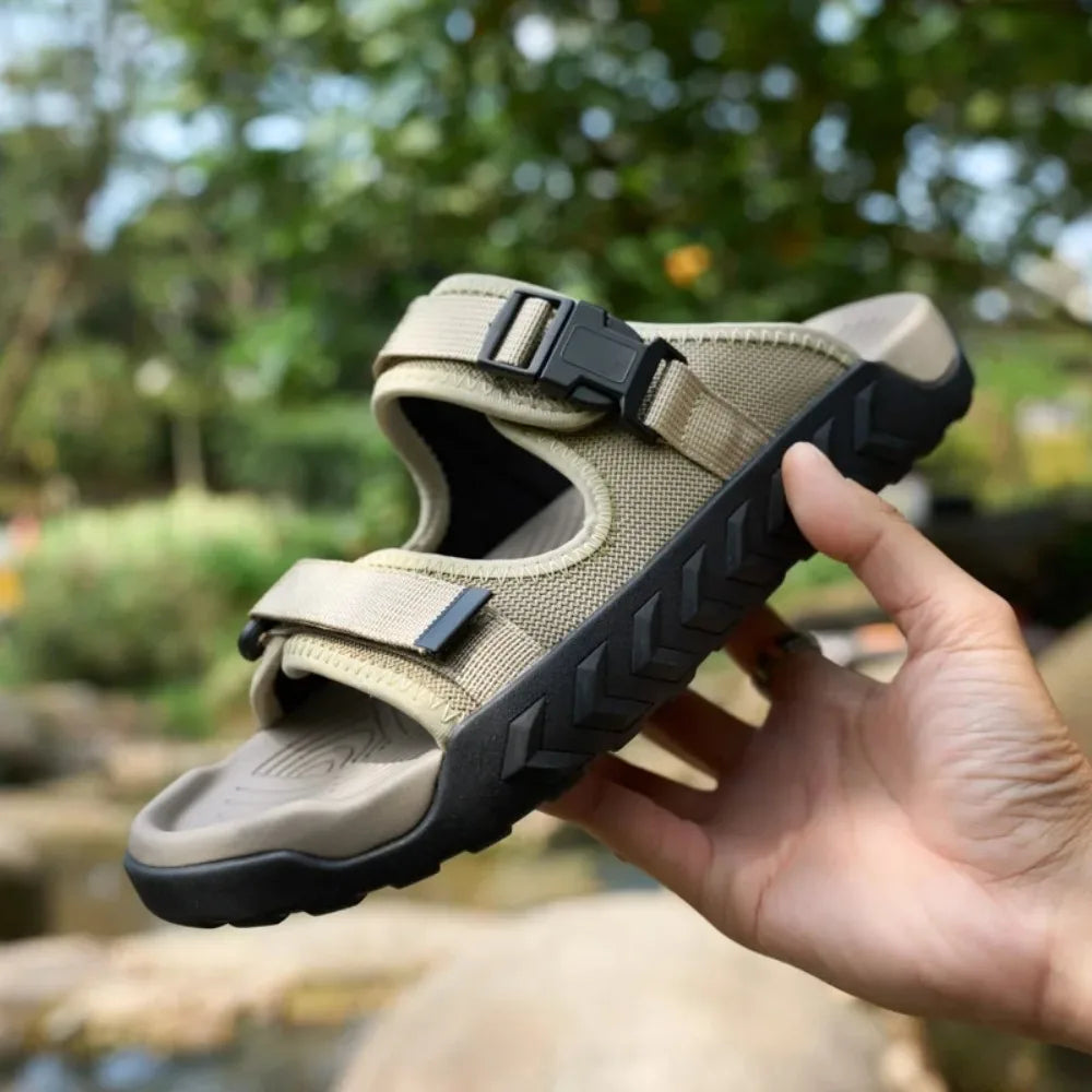 Close-up of Unisex Outdoor Adventure Sandals, adjustable black straps, textured footbed