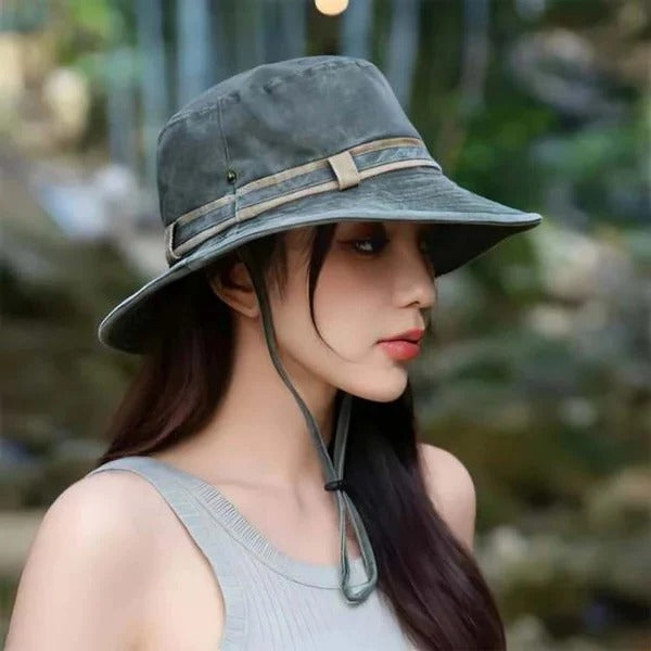 Unisex fishing bucket hat, vented for comfort, with an adjustable chin strap for secure sun protection.