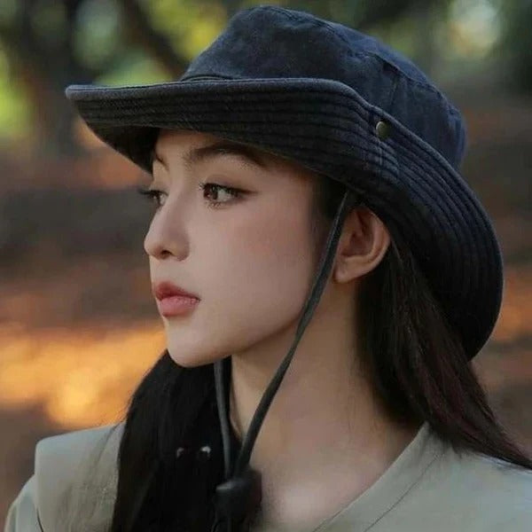 Comfortable vented unisex bucket hat with adjustable chin strap for excellent outdoor sun protection.