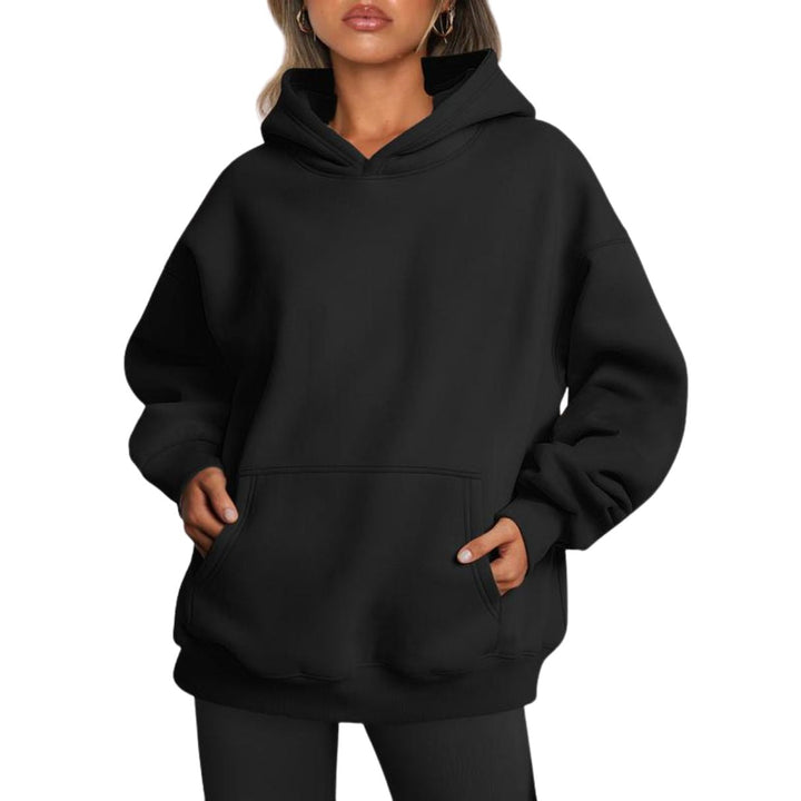 Folded oversized unisex hoodie, highlighting the quality of its heavyweight cotton blend for lasting casual wear
