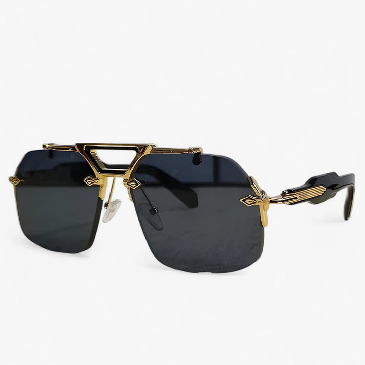 Modern unisex rimless sunglasses, large fit with dazzling mirrored lenses & subtle metal detailing.