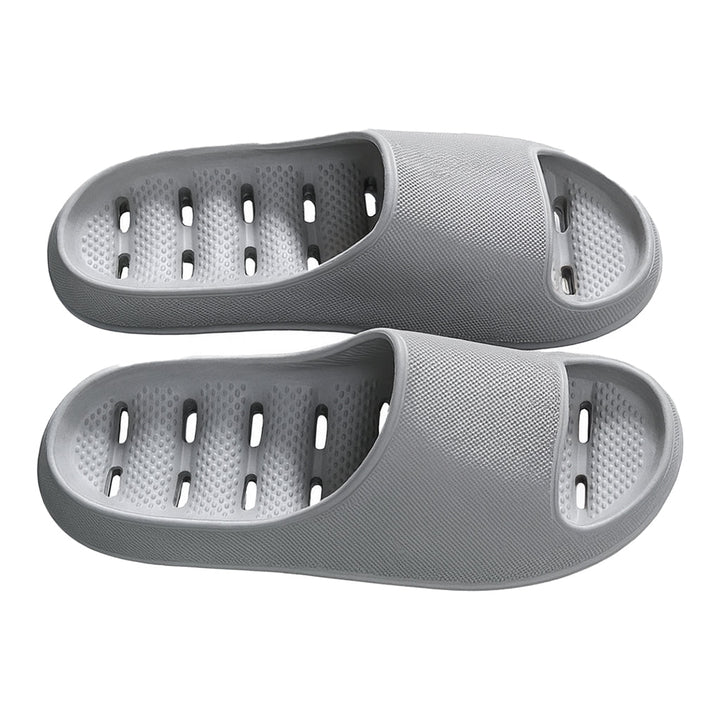 Lightweight unisex slide sandals for shower & pool. Quick-dry design with drainage ensures comfort.