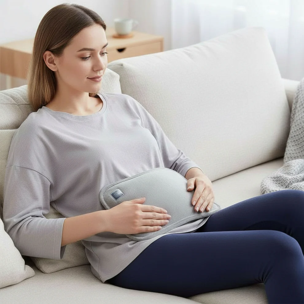 Adjustable warmth heat therapy pad. Rechargeable for targeted pain relief & soothing muscle relaxation.