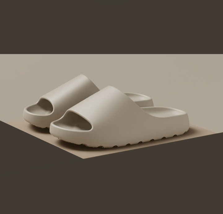 Comfortable unisex open toe slide sandals. Perfect waterproof EVA cloud slippers for beach, pool, home, or summer.