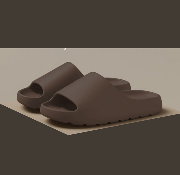 Stylish unisex open toe cloud slippers made from waterproof EVA, offering ultimate comfort for men & women.