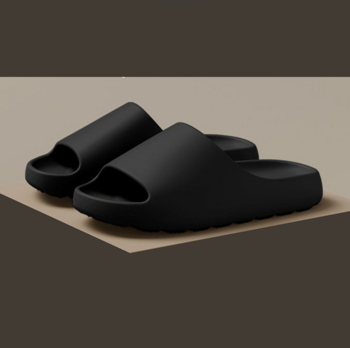 Soft cloud-like unisex open toe slippers, waterproof EVA slides for comfortable wear indoors, outdoors, or poolside.