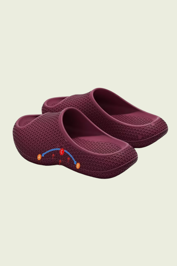 Easy slip-on unisex house shoes with arch support. Non-slip cushioned sole for safe, cloud-like indoor comfort.
