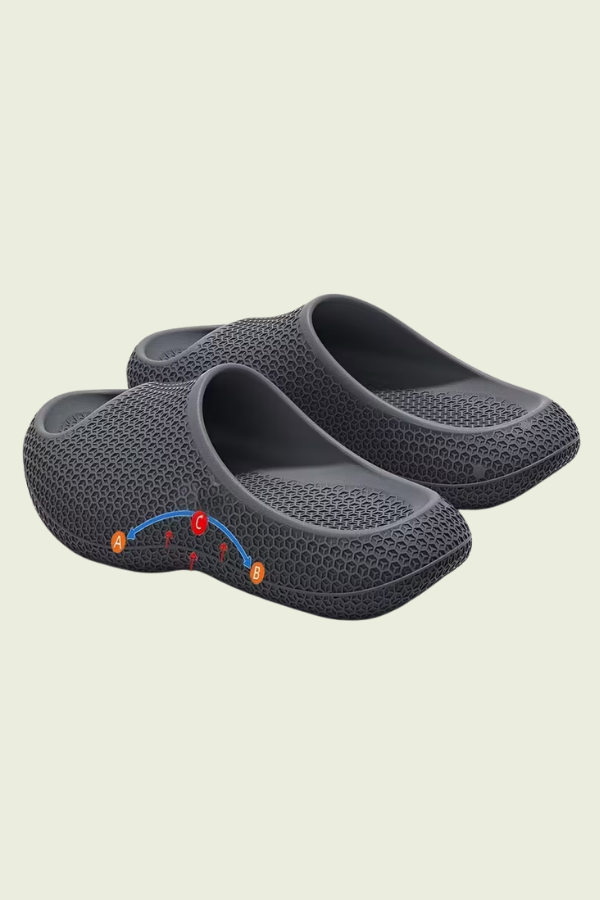 Cloud-like comfort unisex slip-on slippers with strong arch support. Ideal cushioned house shoes for indoor wear.