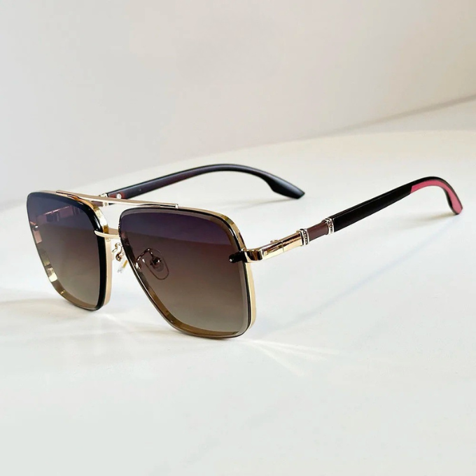 Side view of unisex square aviator sunglasses featuring a sleek metal frame and gradient lenses