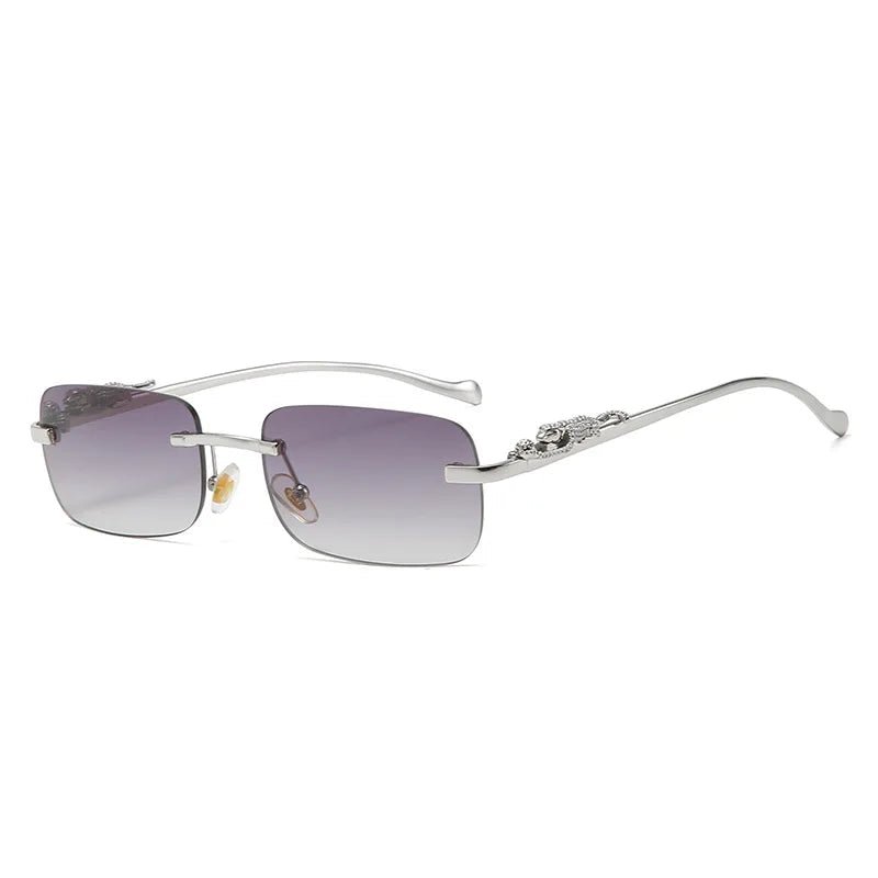 Trendy rimless unisex sunglasses, featuring gradient UV400 lenses for clear vision.