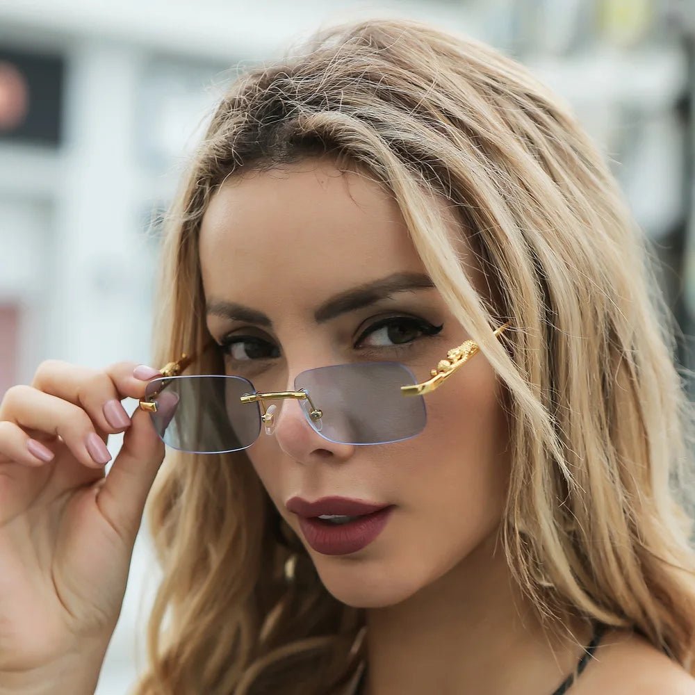 Anti-reflective unisex rimless sunglasses for maximum UV400 protection and style.