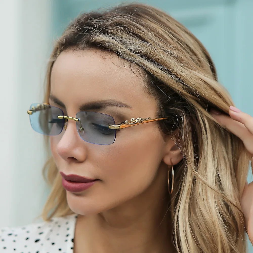Modern unisex rimless sunglasses, a stylish fashion accessory with UV400 sunblock.