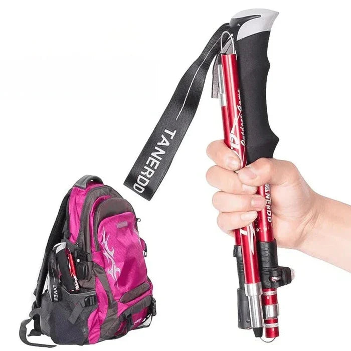 Durable collapsible hiking stick, perfect for trekking. Features adjustable height and comfortable grip for any trail.