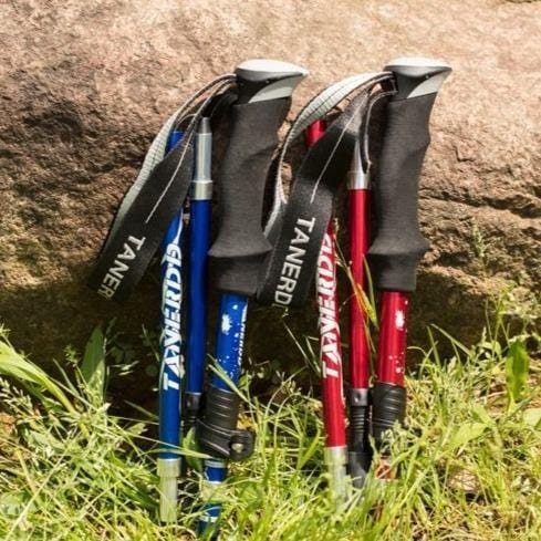 Durable unisex telescopic hiking poles for trekking. Adjustable & portable camping equipment for all outdoor adventures.