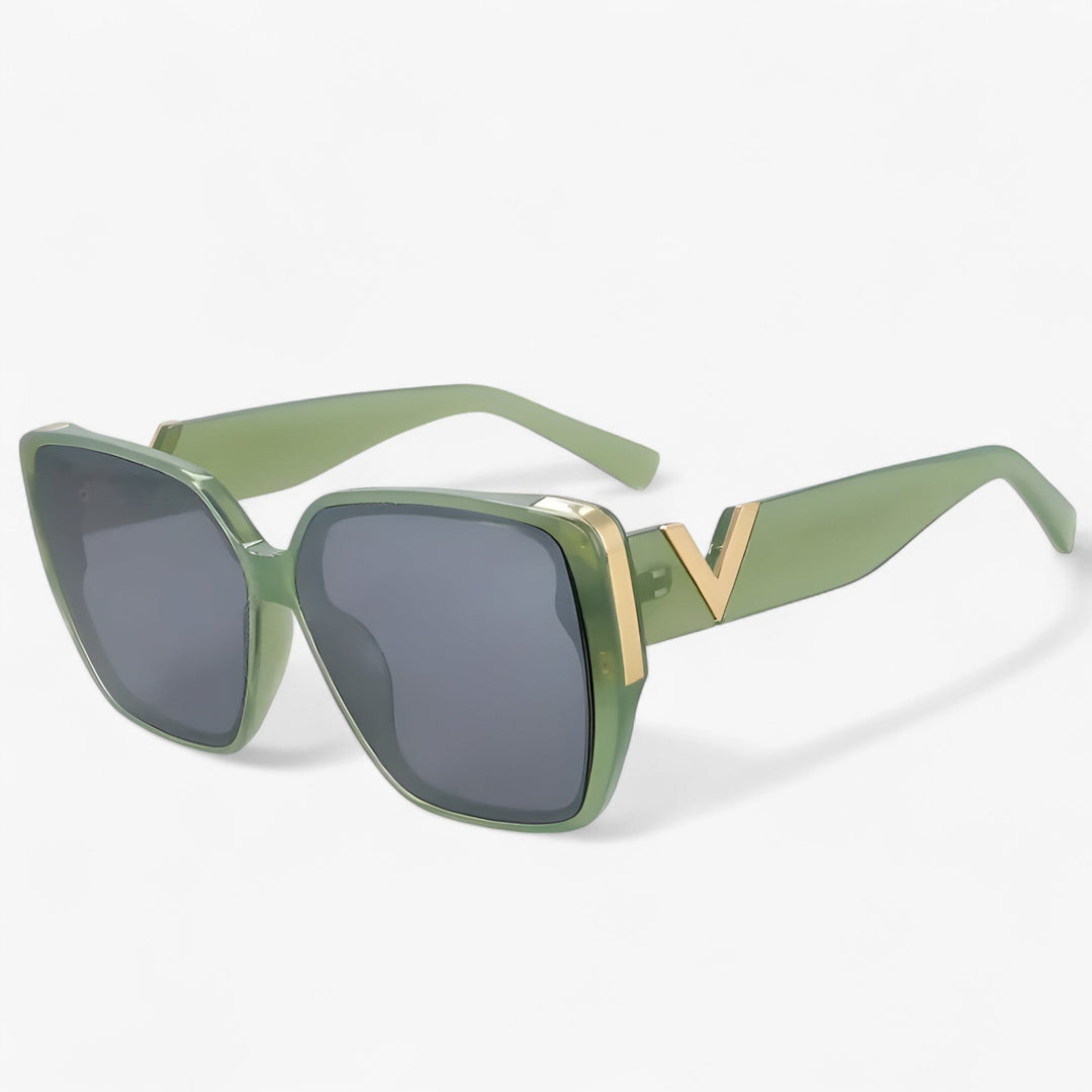 Bold V-shaped mirrored sunglasses for a trendy, futuristic fashion statement.