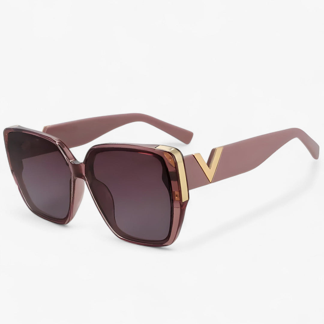 Futuristic V-shaped sunglasses with mirrored lenses, offering UV400 protection.