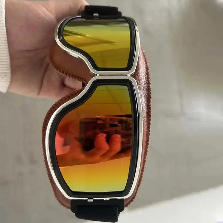Functional vintage motorcycle goggles, combining retro style with modern eye protection & wind resistance.