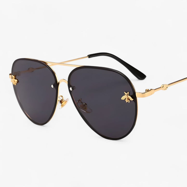 Stylish unisex retro pilot sunglasses with a unique bee design, perfect for fashion-forward looks & luxury.