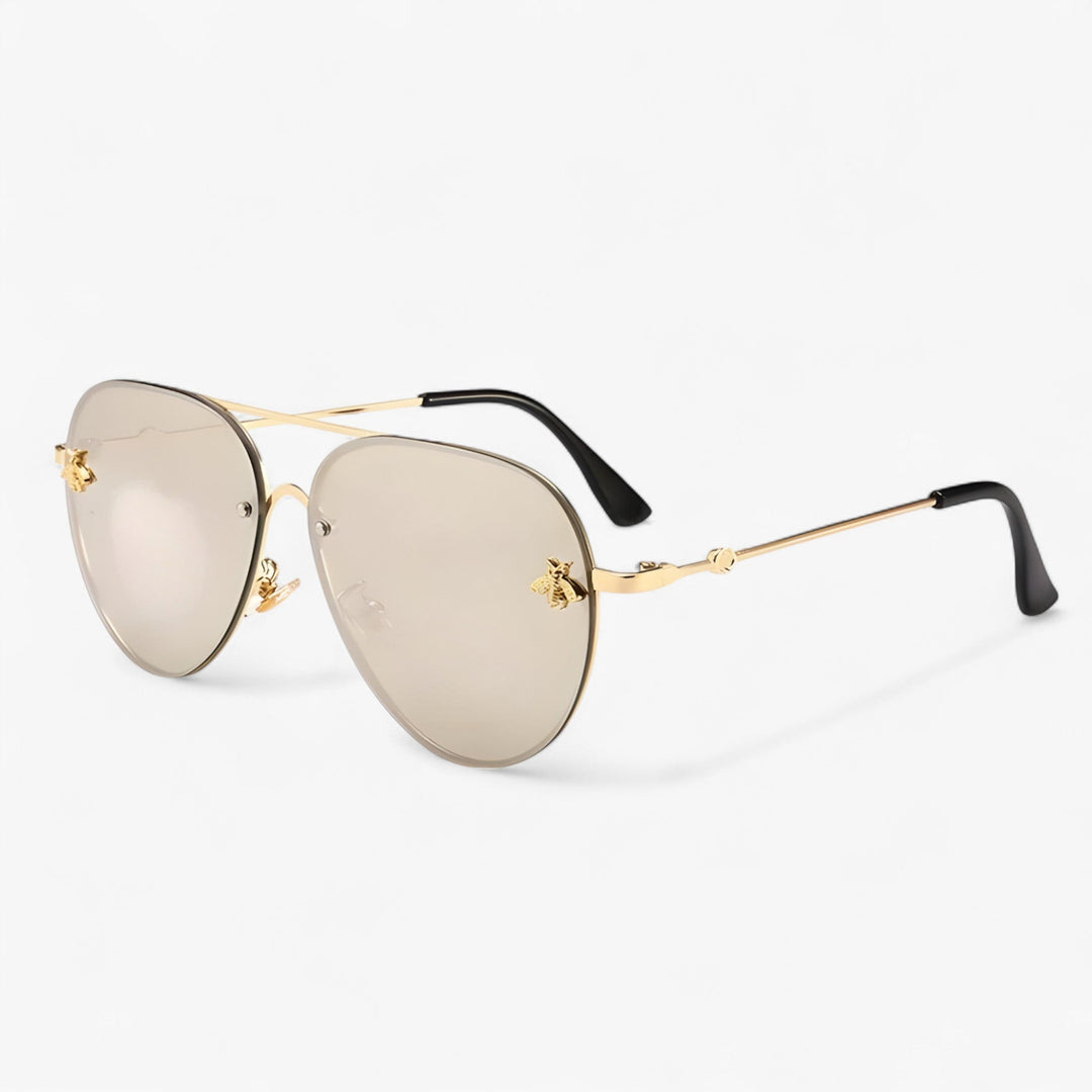 Iconic pilot-style vintage sunglasses for men & women, adorned with a sophisticated bee motif, luxury fashion.